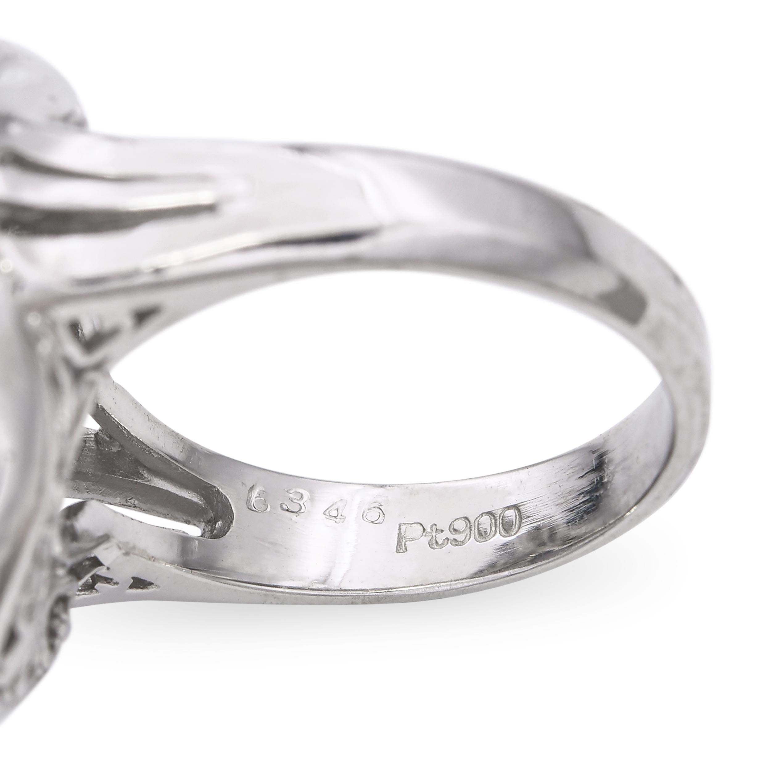 Platinum 3.50ct Star Sapphire and Diamond Baguette Halo