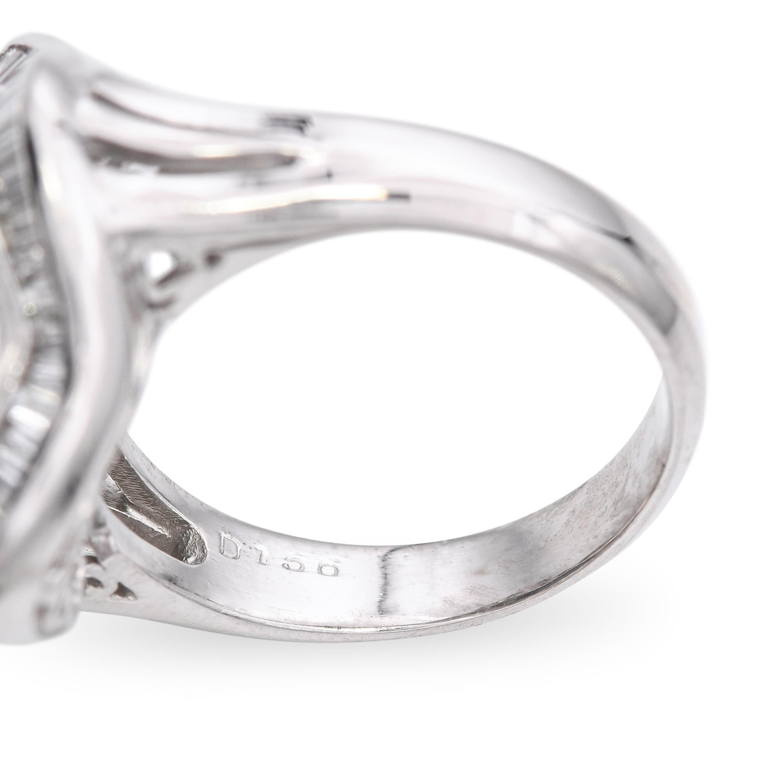 Platinum 3.50ct Star Sapphire and Diamond Baguette Halo