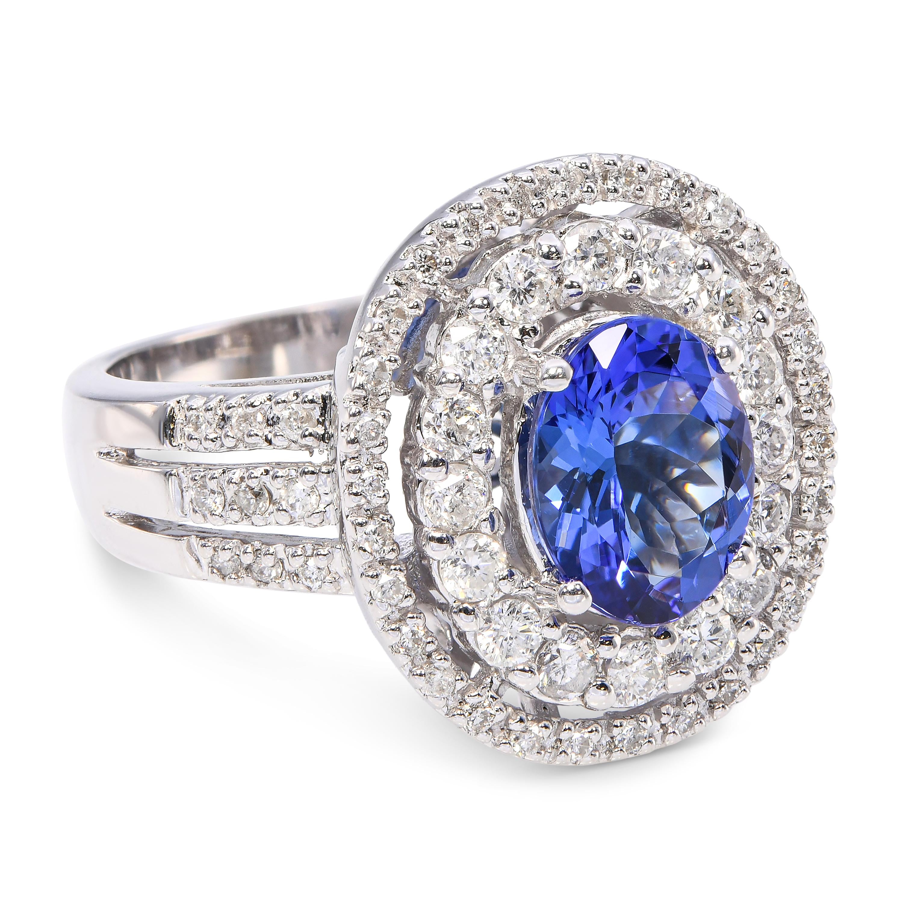 Vintage 14k White Gold Tanzanite and Diamond Halo Ring