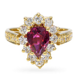 Vintage 18k Yellow Gold Ruby and Diamond Halo Ring