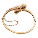 Vintage 14k Yellow Gold Pearl and Diamond Bypass Hinged Bangle Bracelet