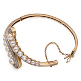 Vintage 14k Yellow Gold Pearl and Diamond Bypass Hinged Bangle Bracelet
