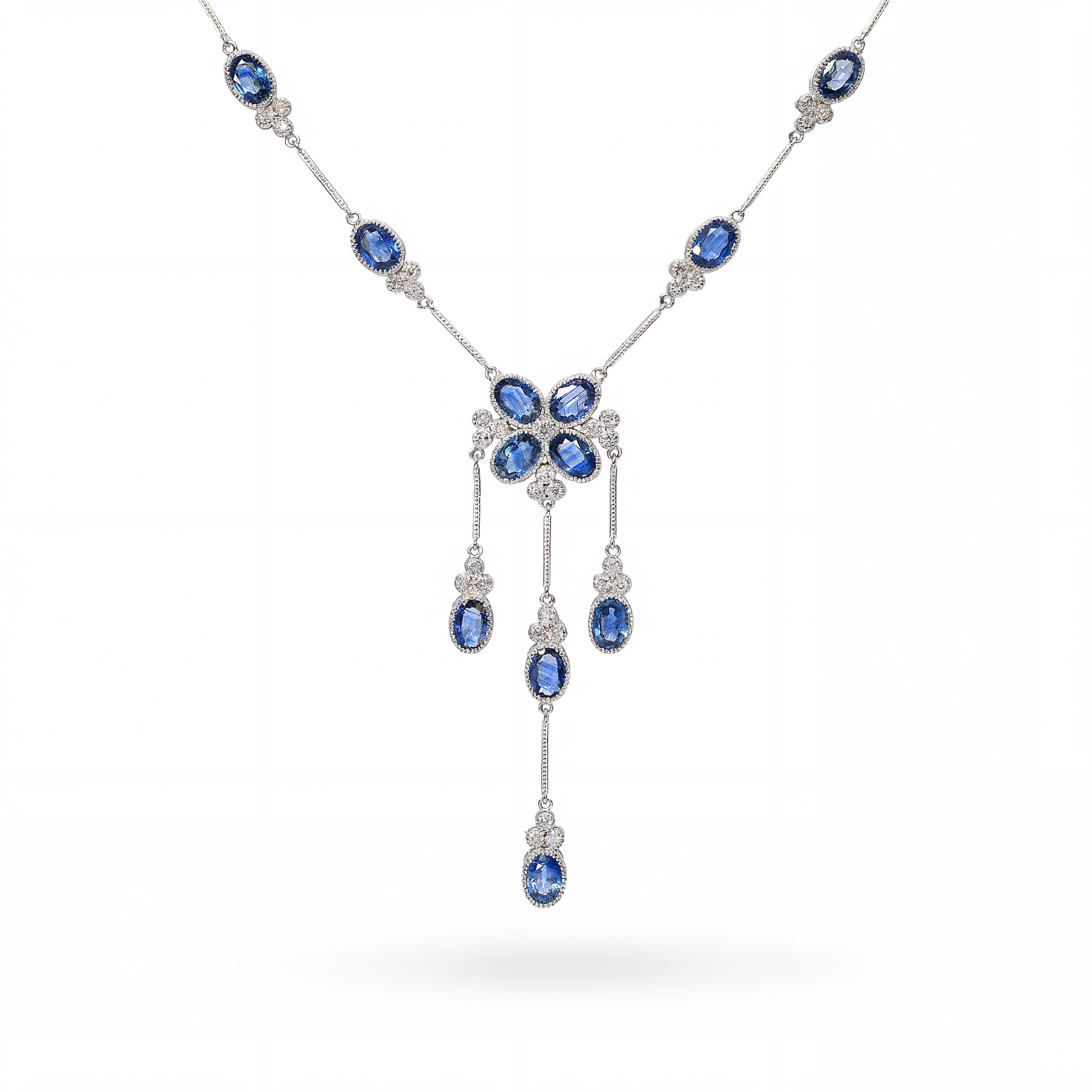 13k White Gold 8.04ctw Sapphire and 1.47ctw Diamond Trefoil Station Necklace