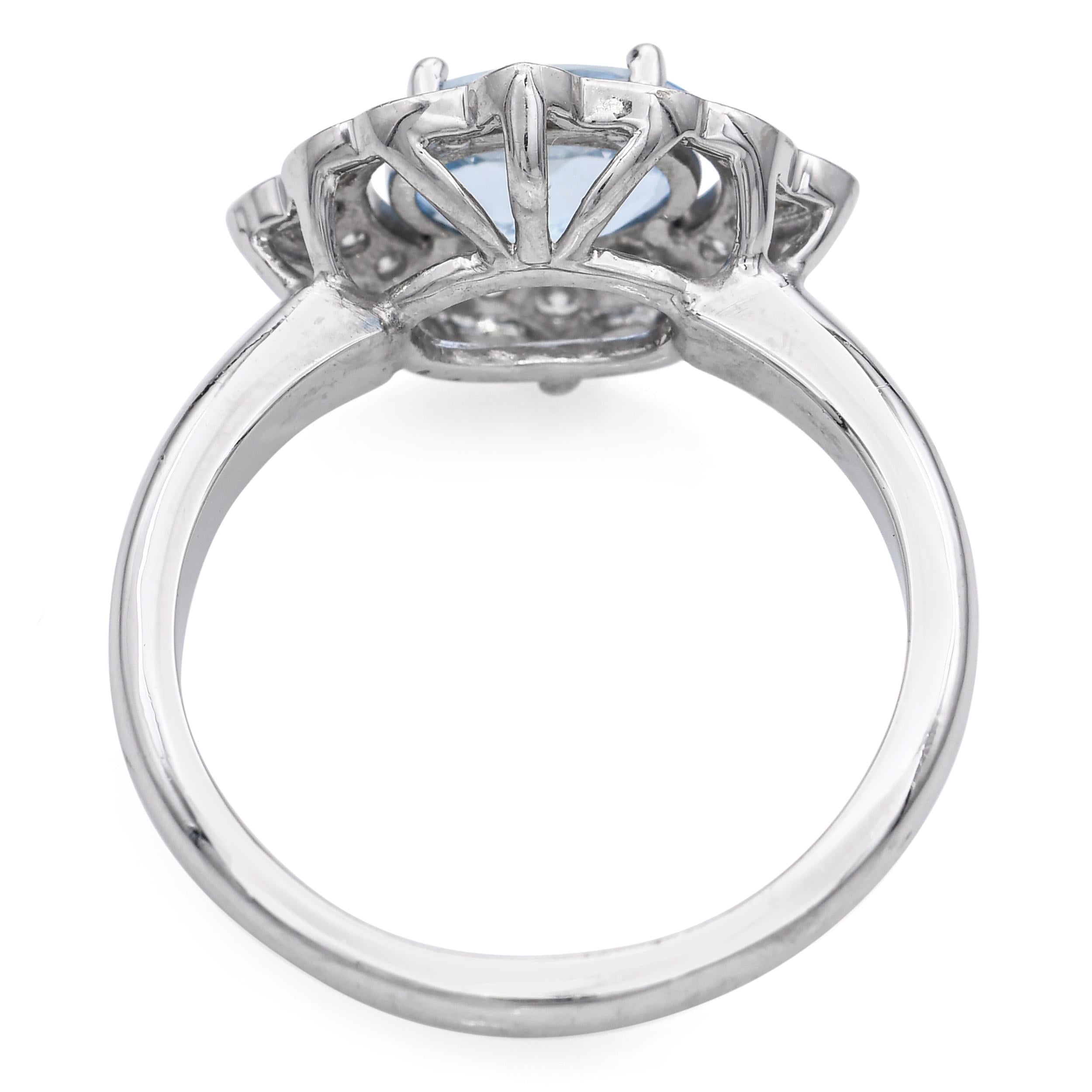 14k White Gold Aquamarine and Diamond Halo Ring