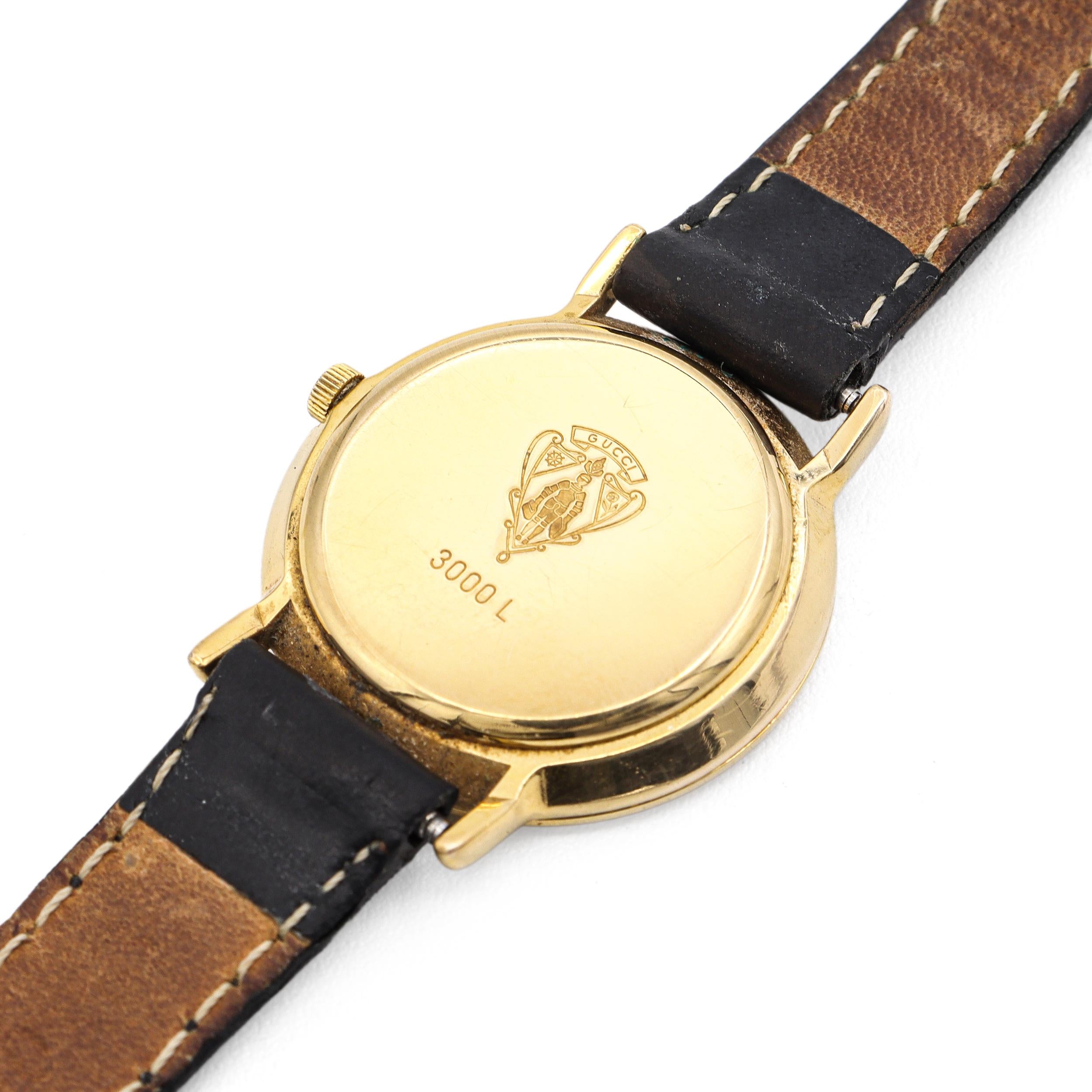 Gucci 3000L Gold Plated Black Dial Roman Numeral Quartz Women’s Watch