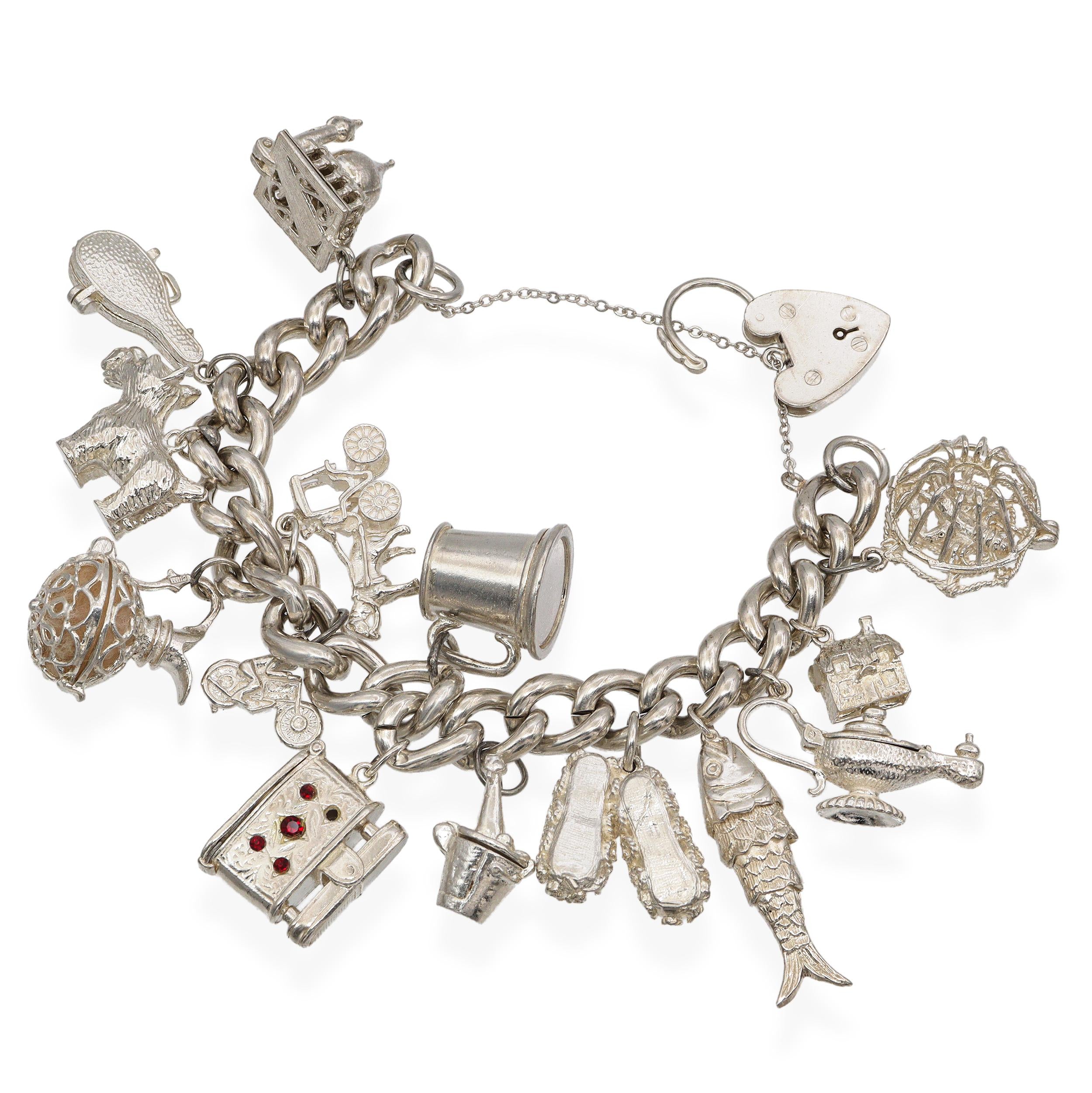 Vintage Sterling Silver Charm Bracelet with 15 Charms and Heart Lock Clasp