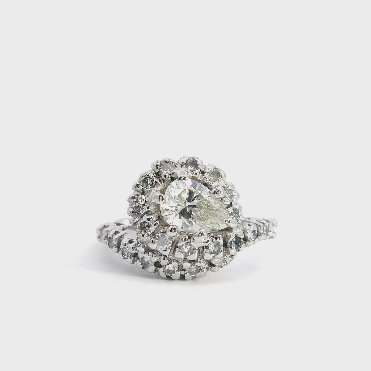 Vintage White Gold 0.75ct Pear Diamond With Swirl Diamonds Halo Ring