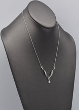 Vintage 14K White Gold Diamond Swirl Necklace